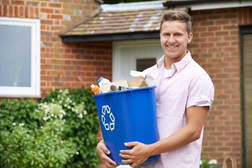 Operatives segregating garden waste on site